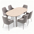 Oval oak dining table with six upholstered chairs in light grey fabric